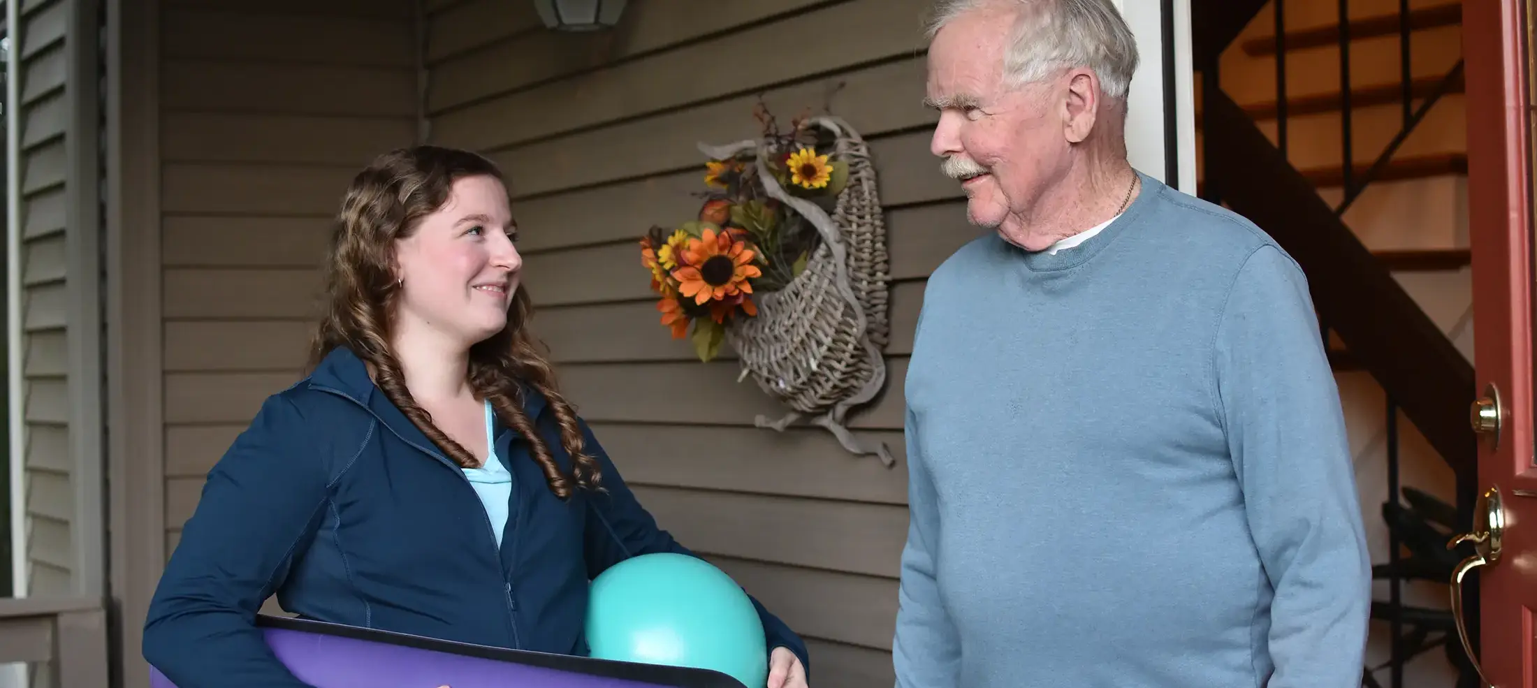 in-home-senior-personal-training holding hands of older person