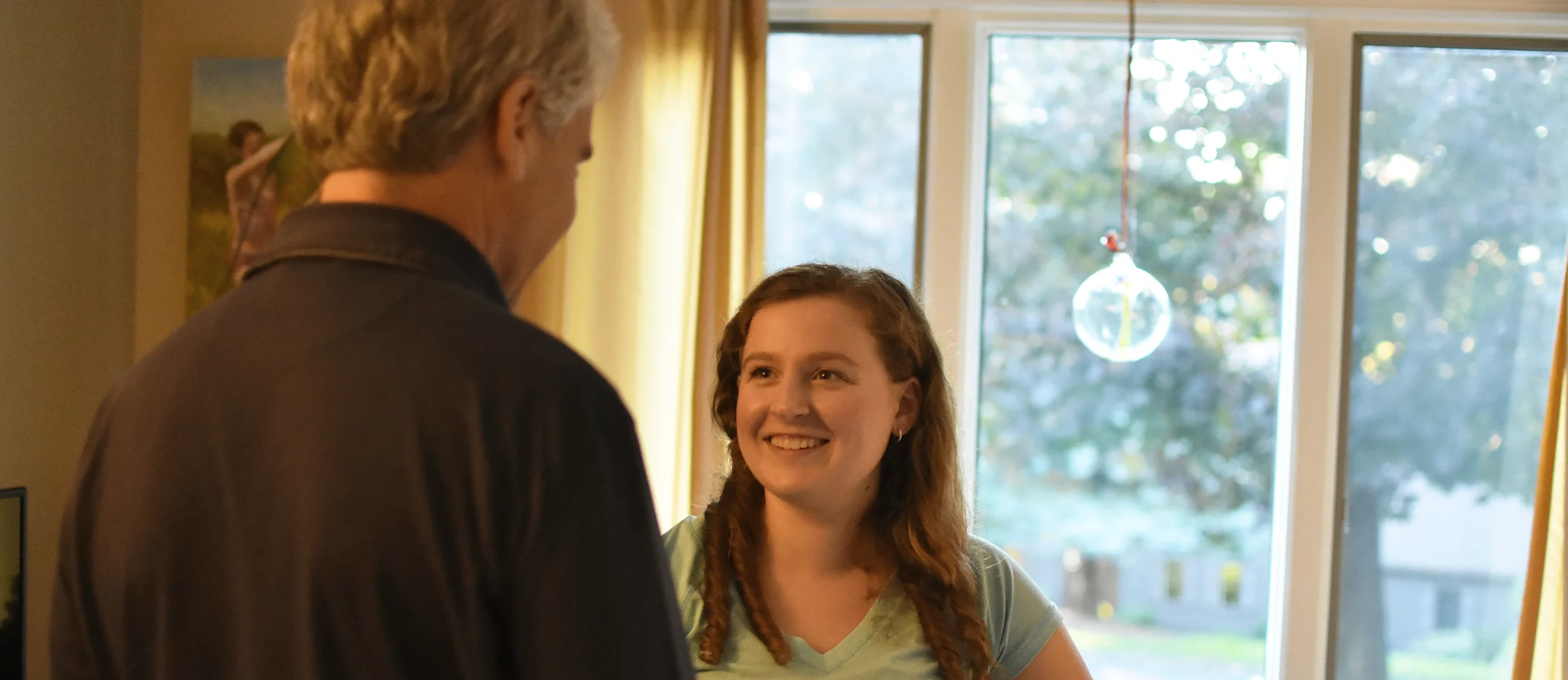 client-discussion-older-adult Sophia speaking to male client
